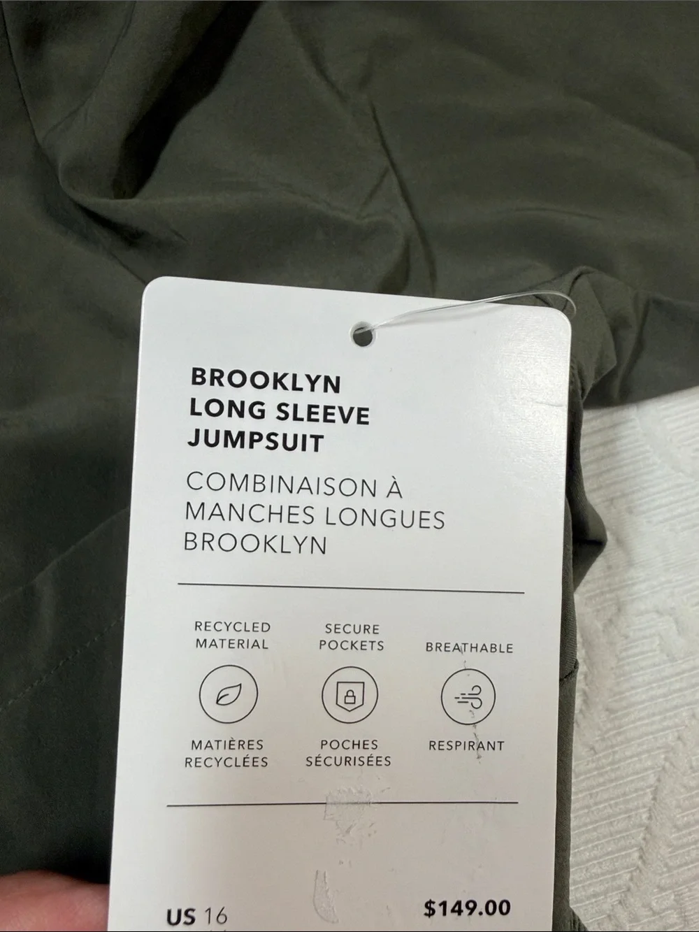 Athleta Brooklyn long sleeve jumpsuit. Size 16 deep green NWT.